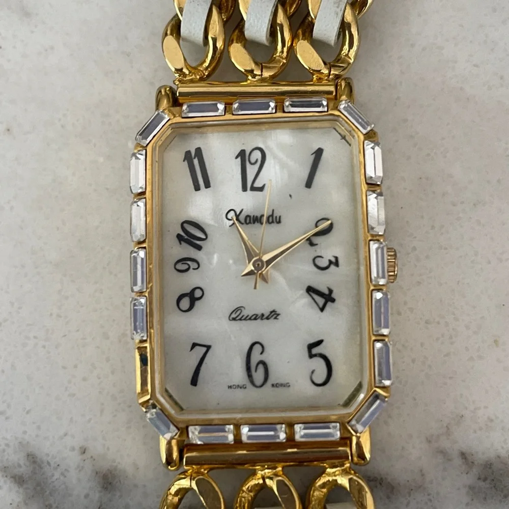 Xanadu Quartz watch in gold tone with embellishments